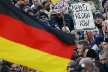 Меркель отменила поездку на экономический форум в Давосе из-за мигрантов