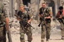 الدولة الإسلامية محاصرة في الرقة لكن قياديا كرديا يتوقع معركة طويلة